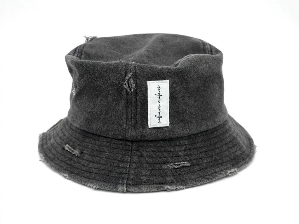 William Milazi distressed bucket hat with woven script tab